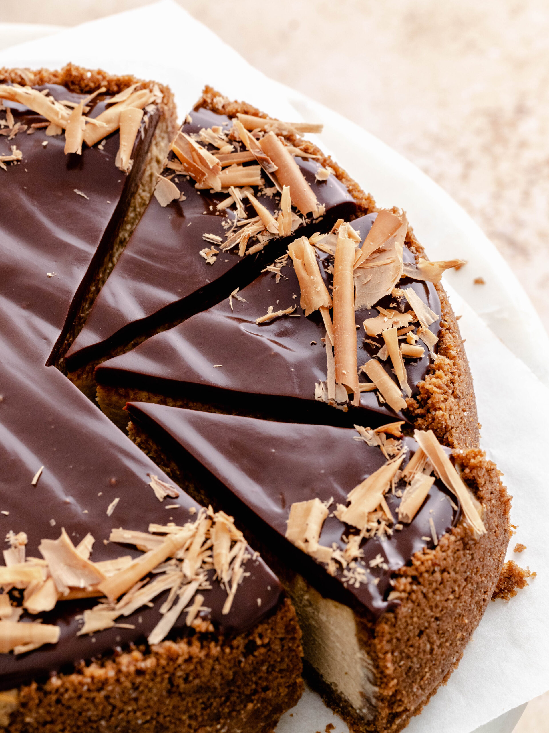 Espresso cheesecake cut into pieces on a tray.