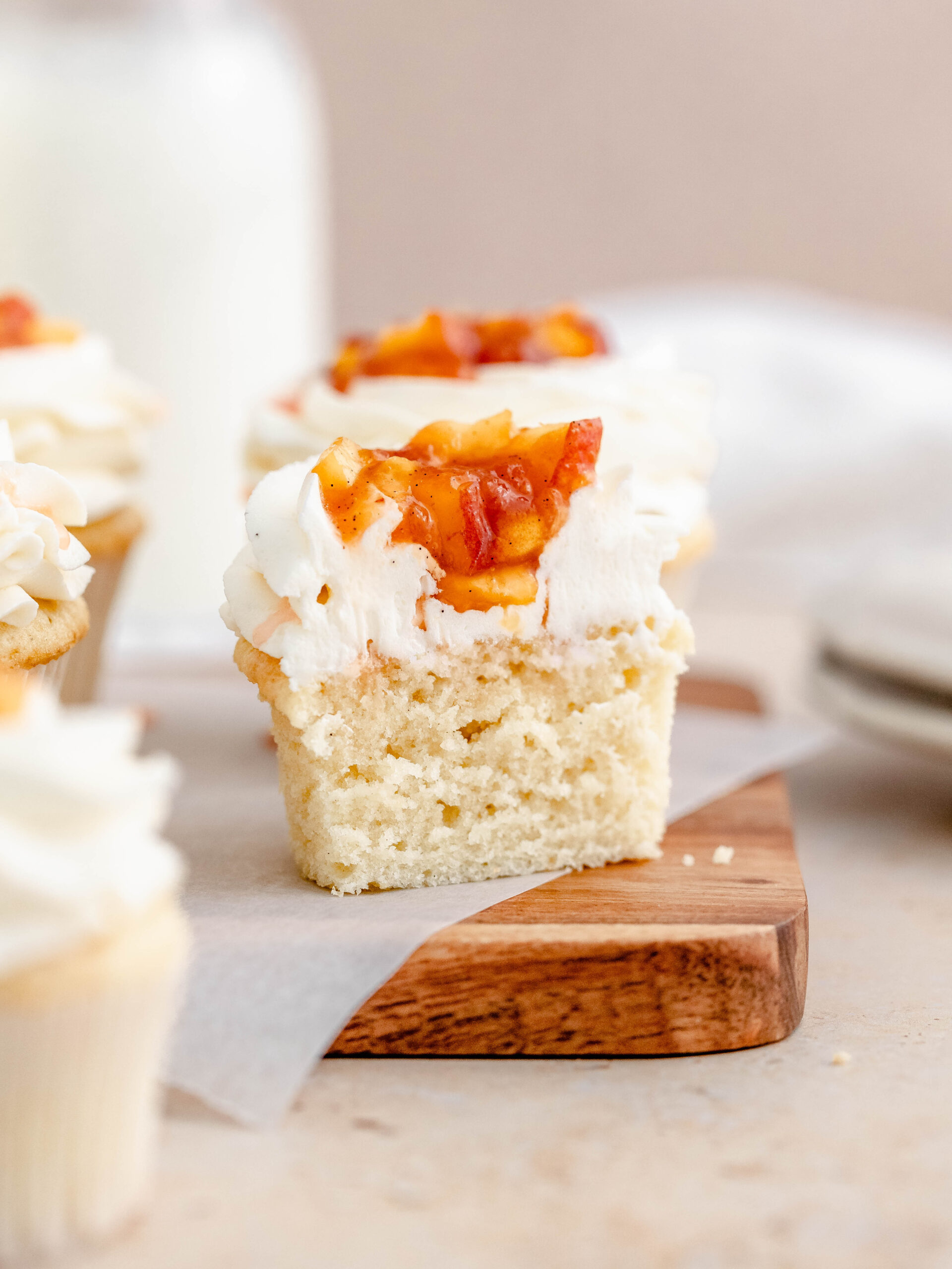 A soft vanilla cupcake, with a delicious vanilla buttercream and peach compote.