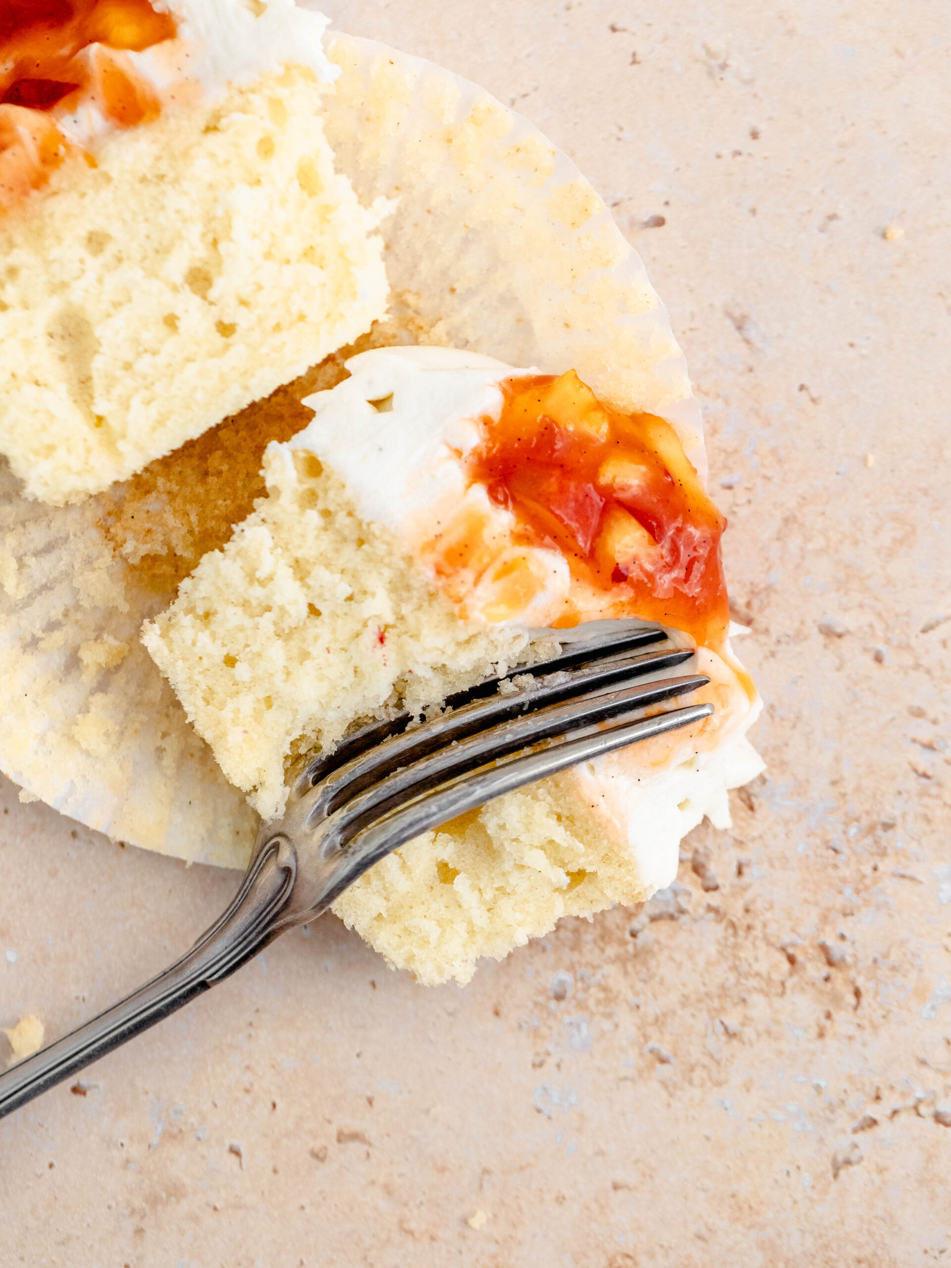 A soft vanilla cupcake, with a delicious vanilla buttercream and peach compote.