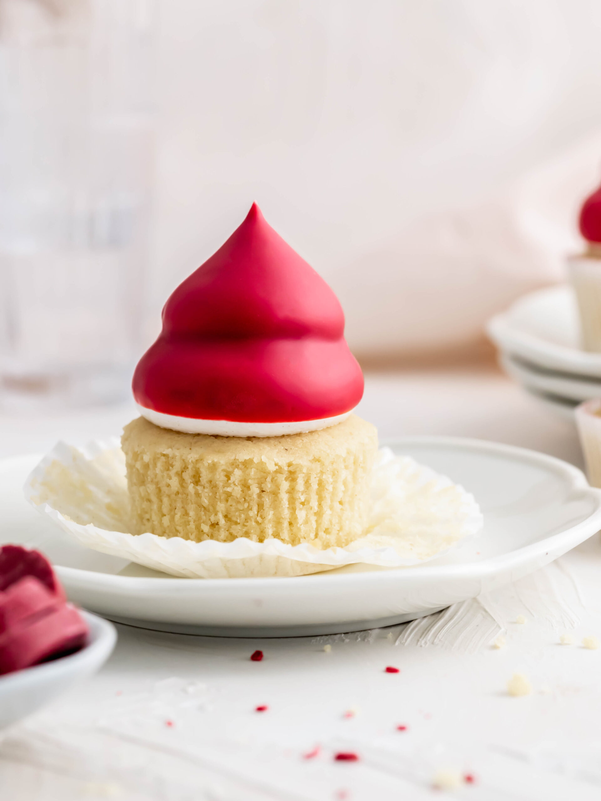 Raspberry Cream Puff cupcake on a plate