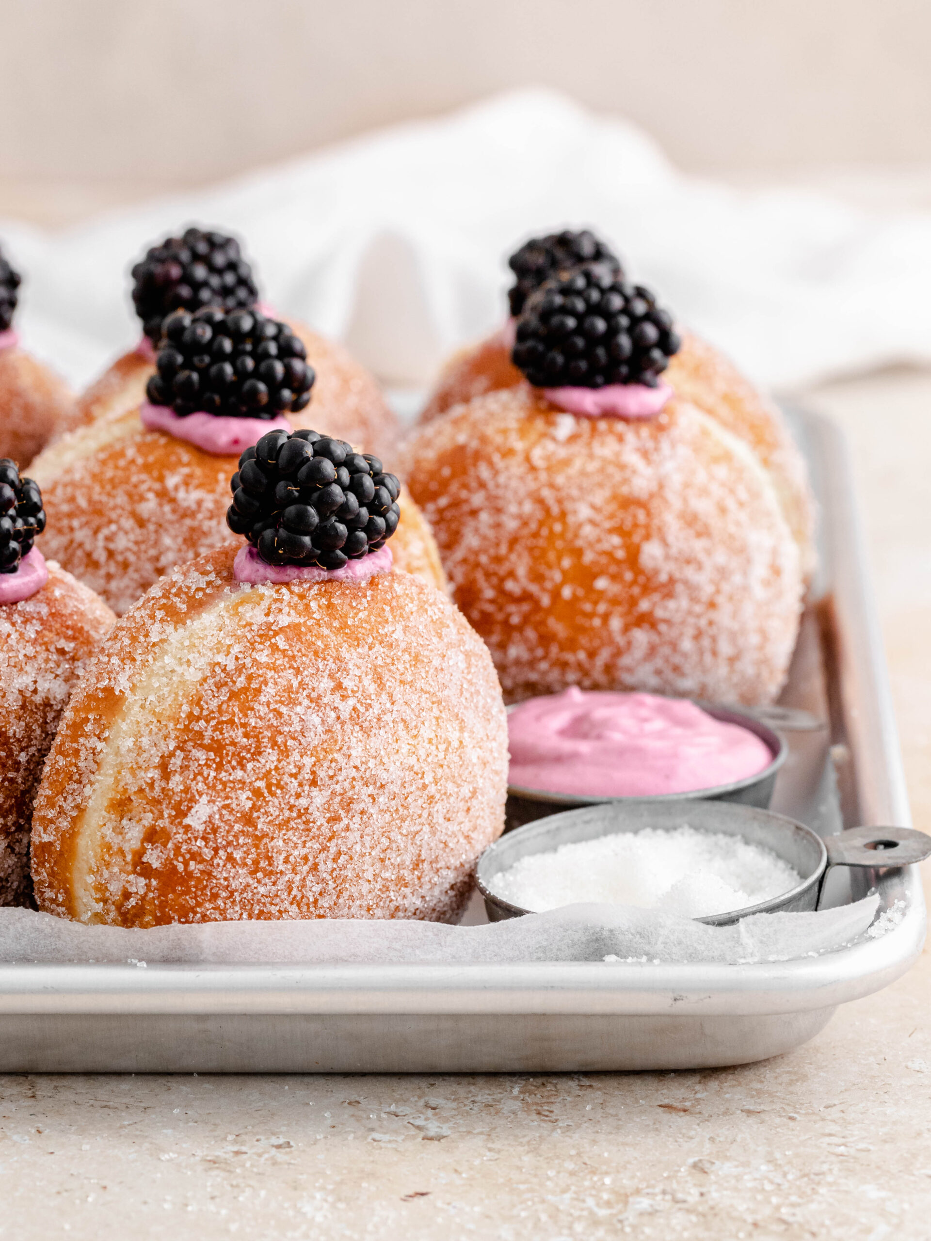 Filled blackberry cheesecake donuts.