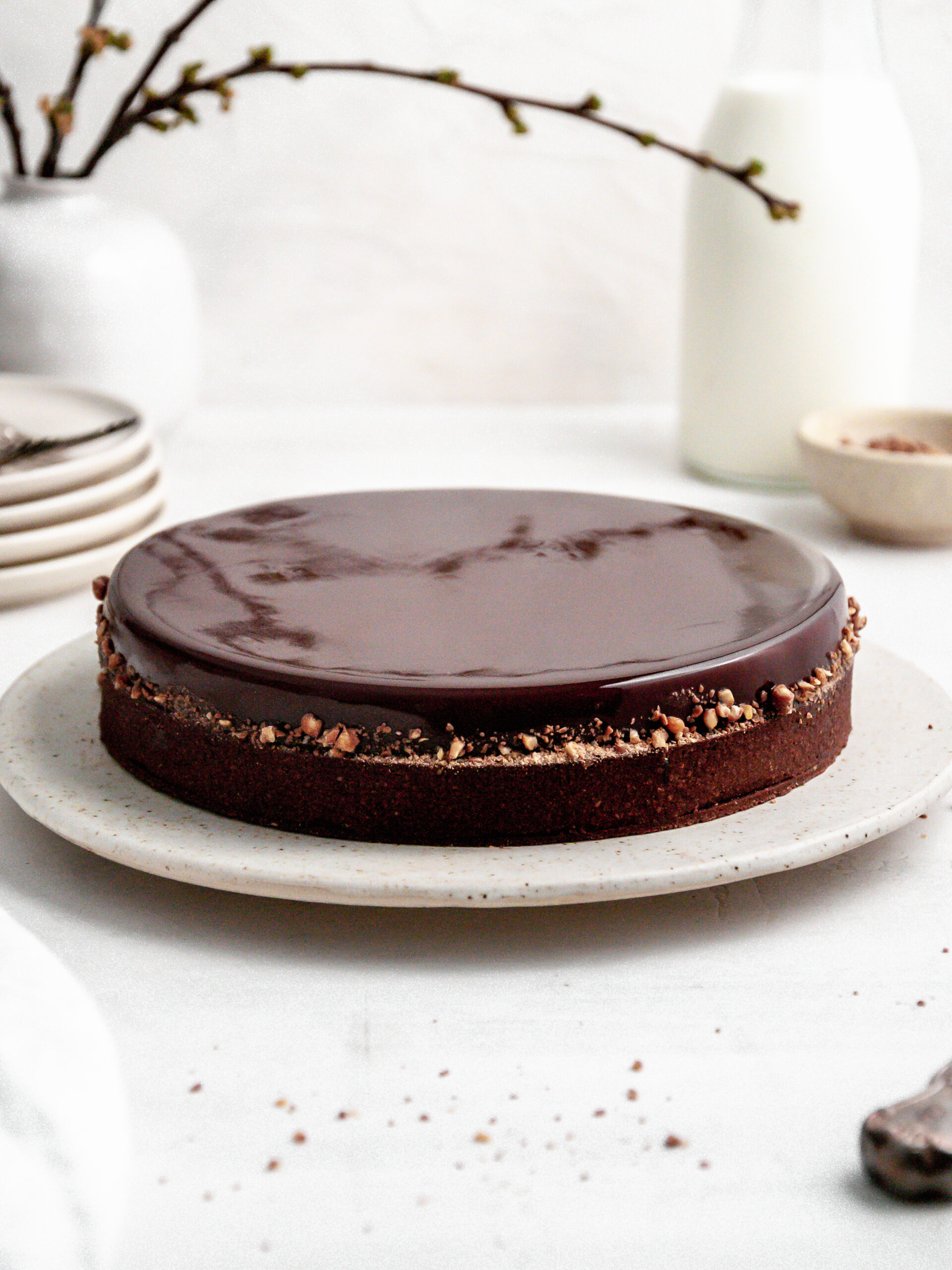 Chocolate Coffee and Caramel Tart on a cake stand.