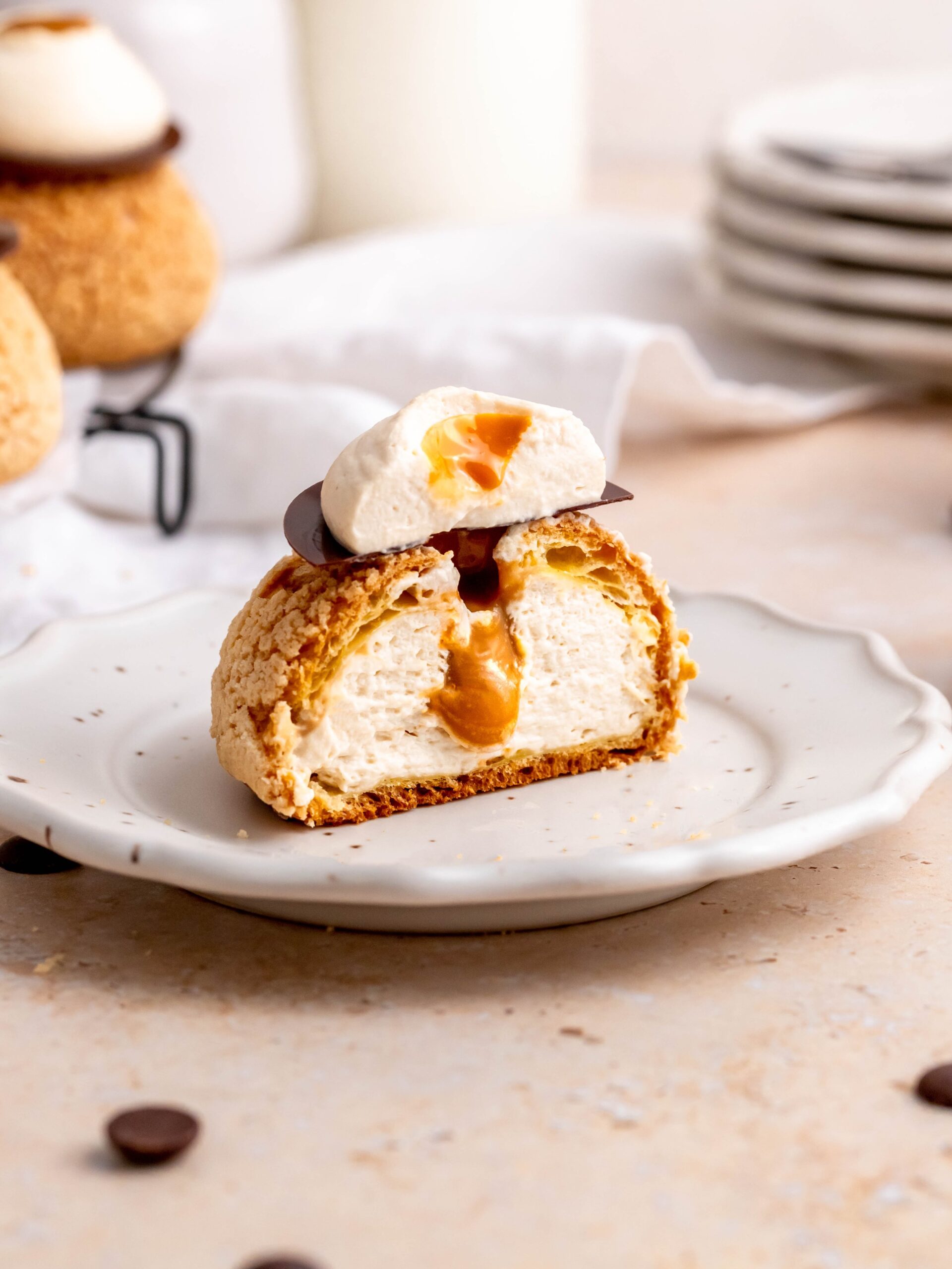 Choux au Craquelin with Coffee and Salted Dulce de Leche on a plate