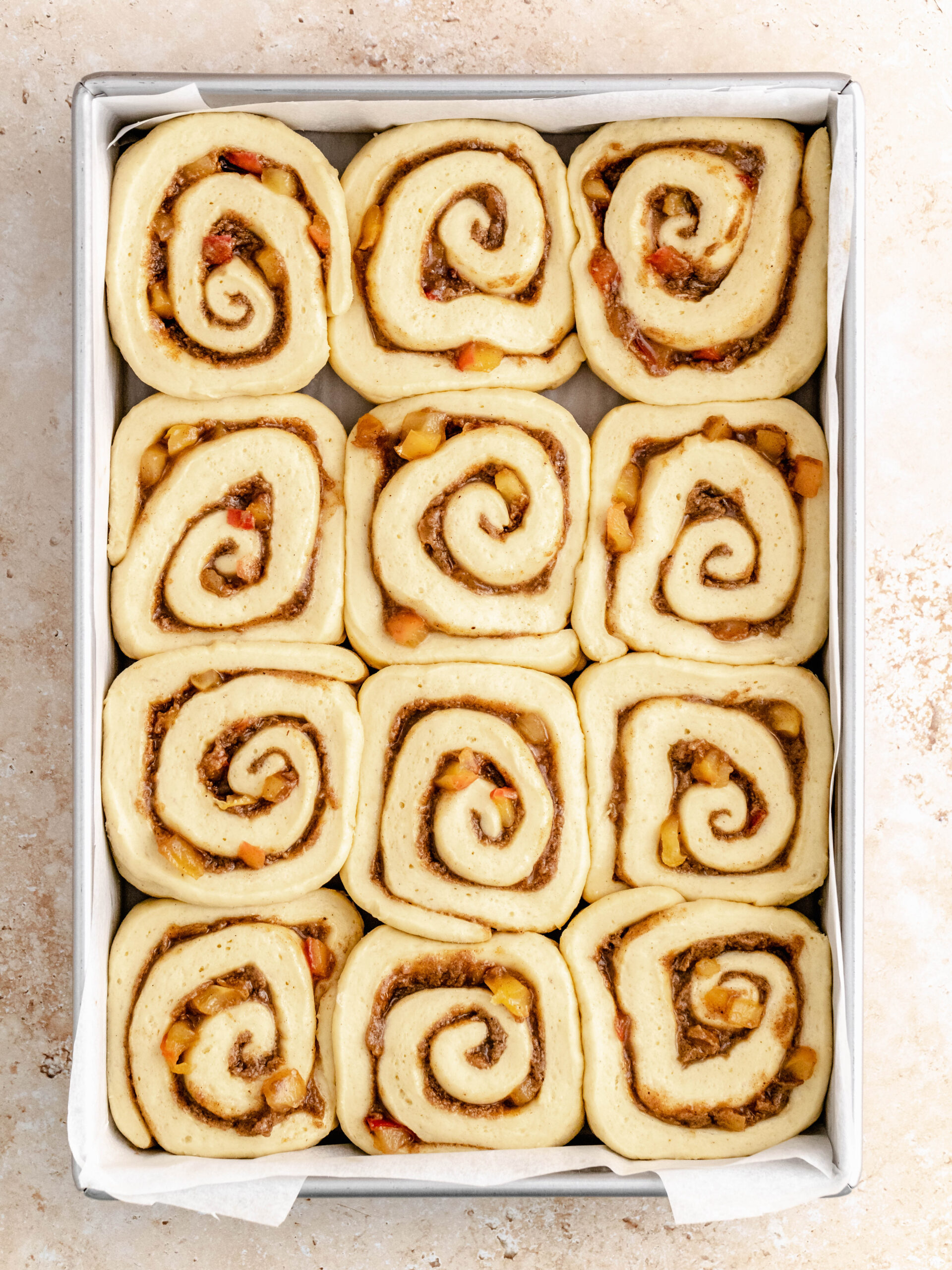 Cinnamon Rolls with Apple Pie filling after their second proofing.