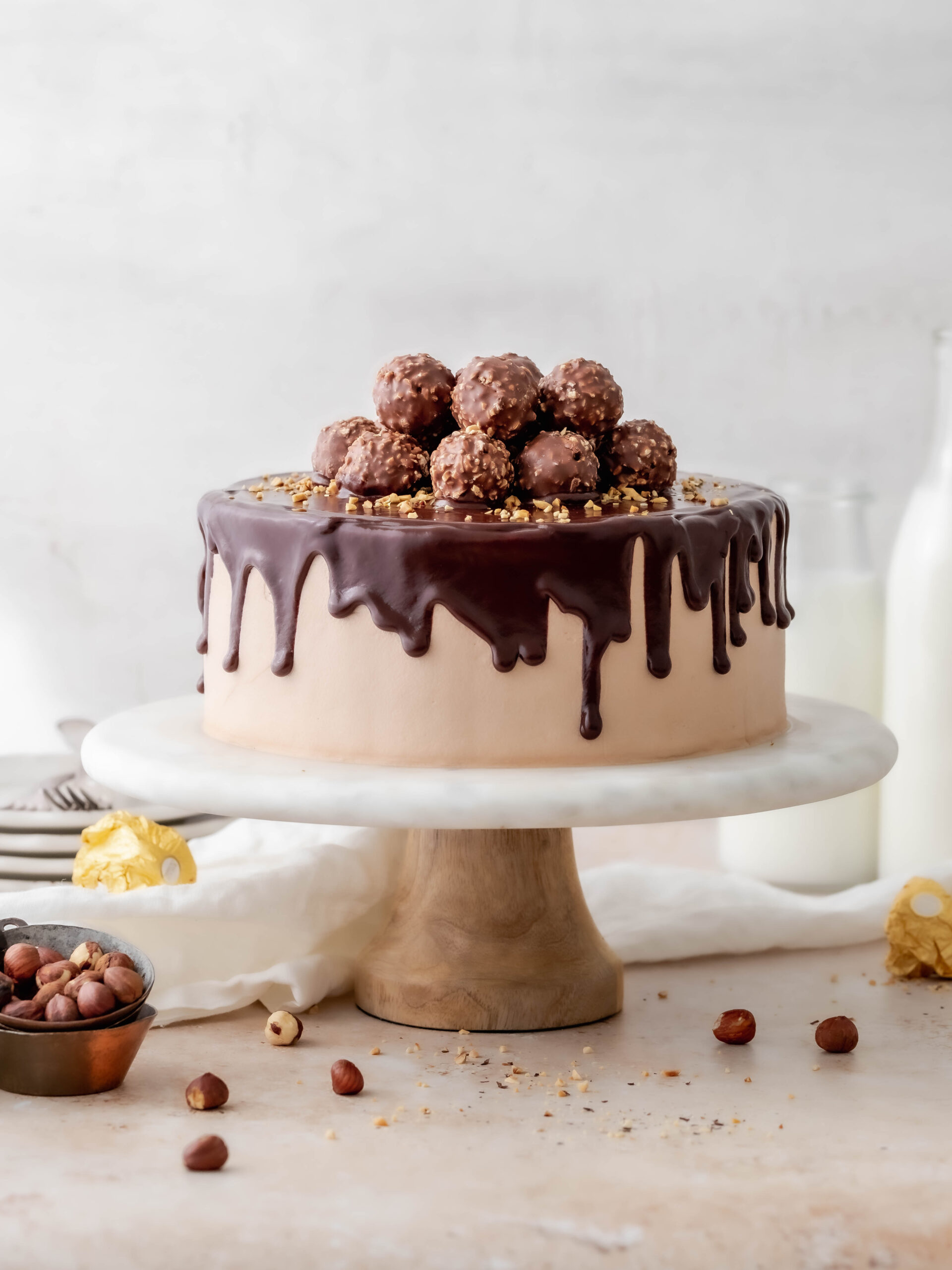 Ferrero Rocher Cake on a cake stand.
