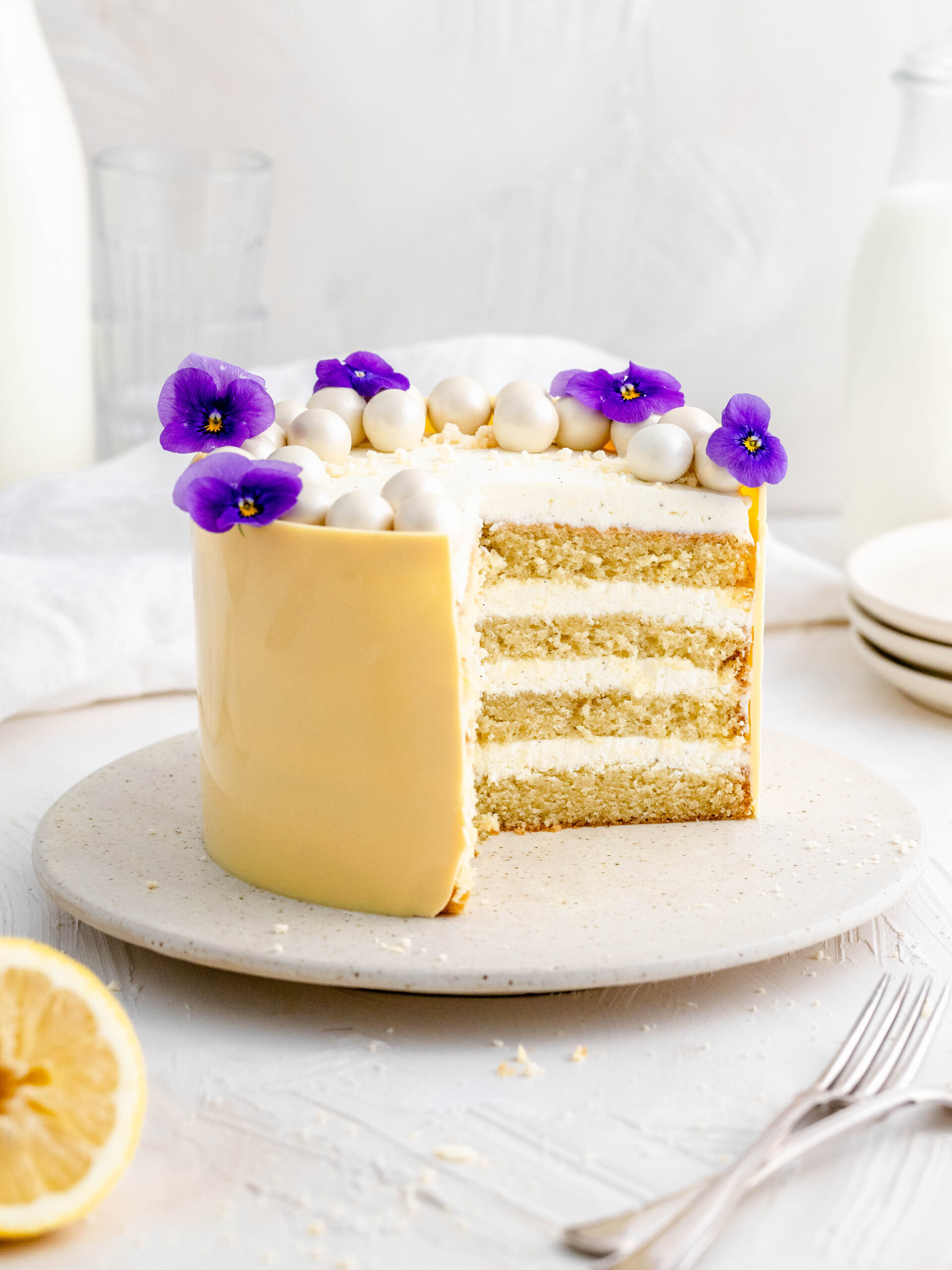 lemon and mascarpone cake on a cake stand.