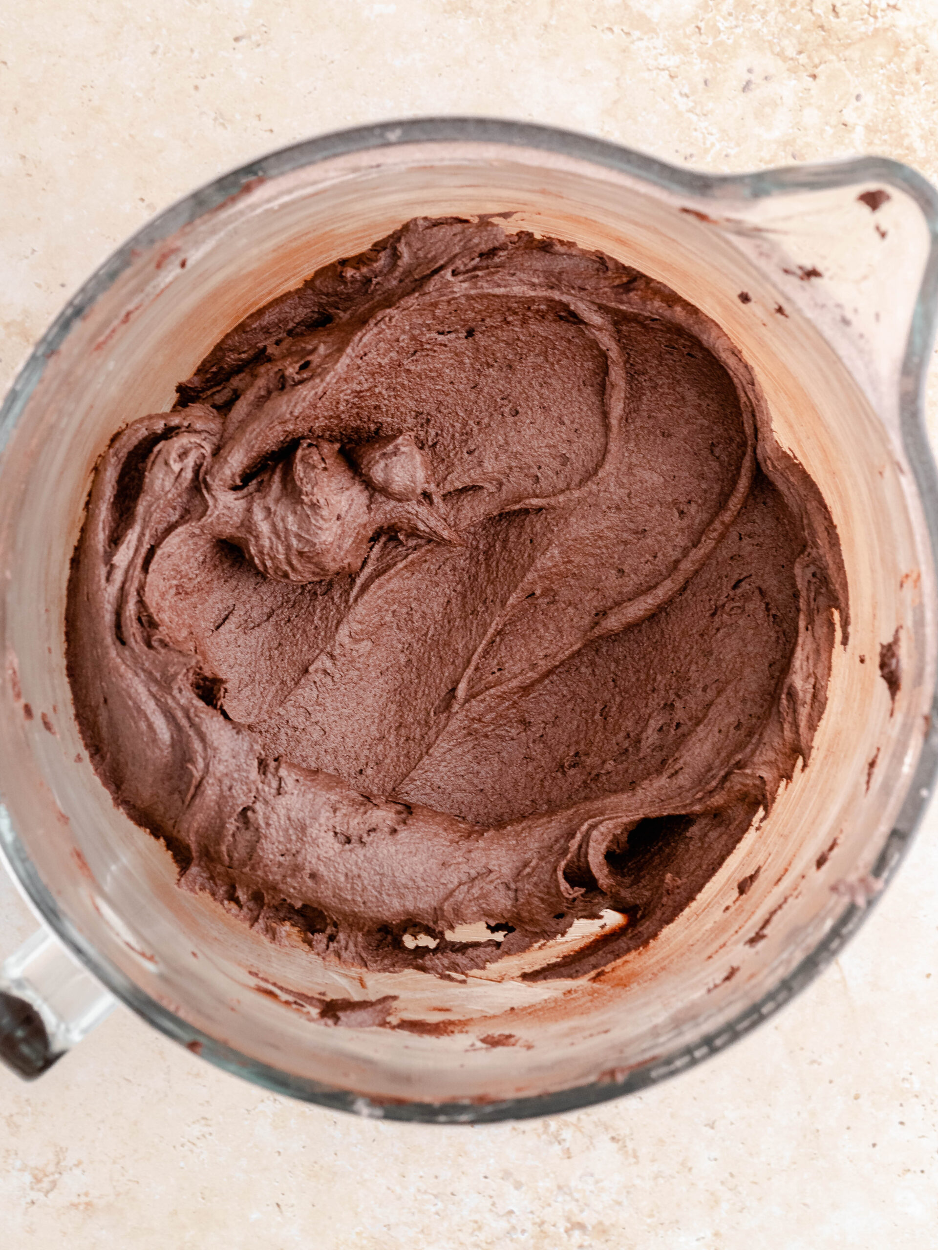 Chocolate buttercream in a mixing bowl.