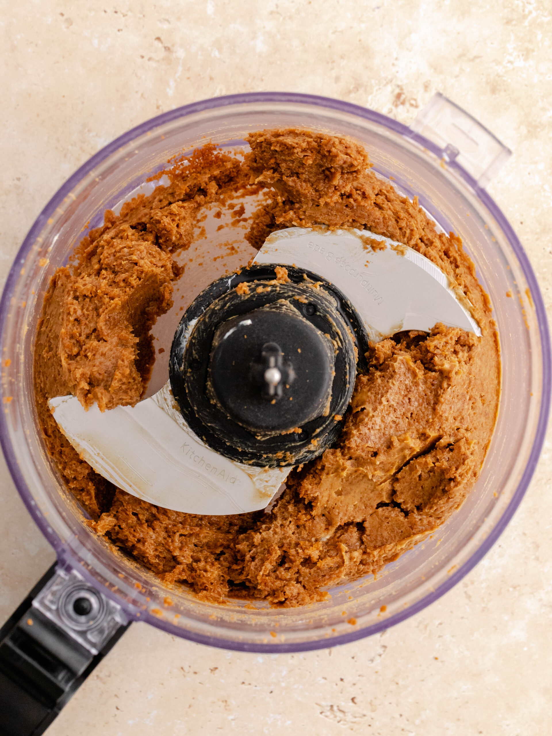 Step 2. Add cream cheese and blend it together with the Biscoff cookies.