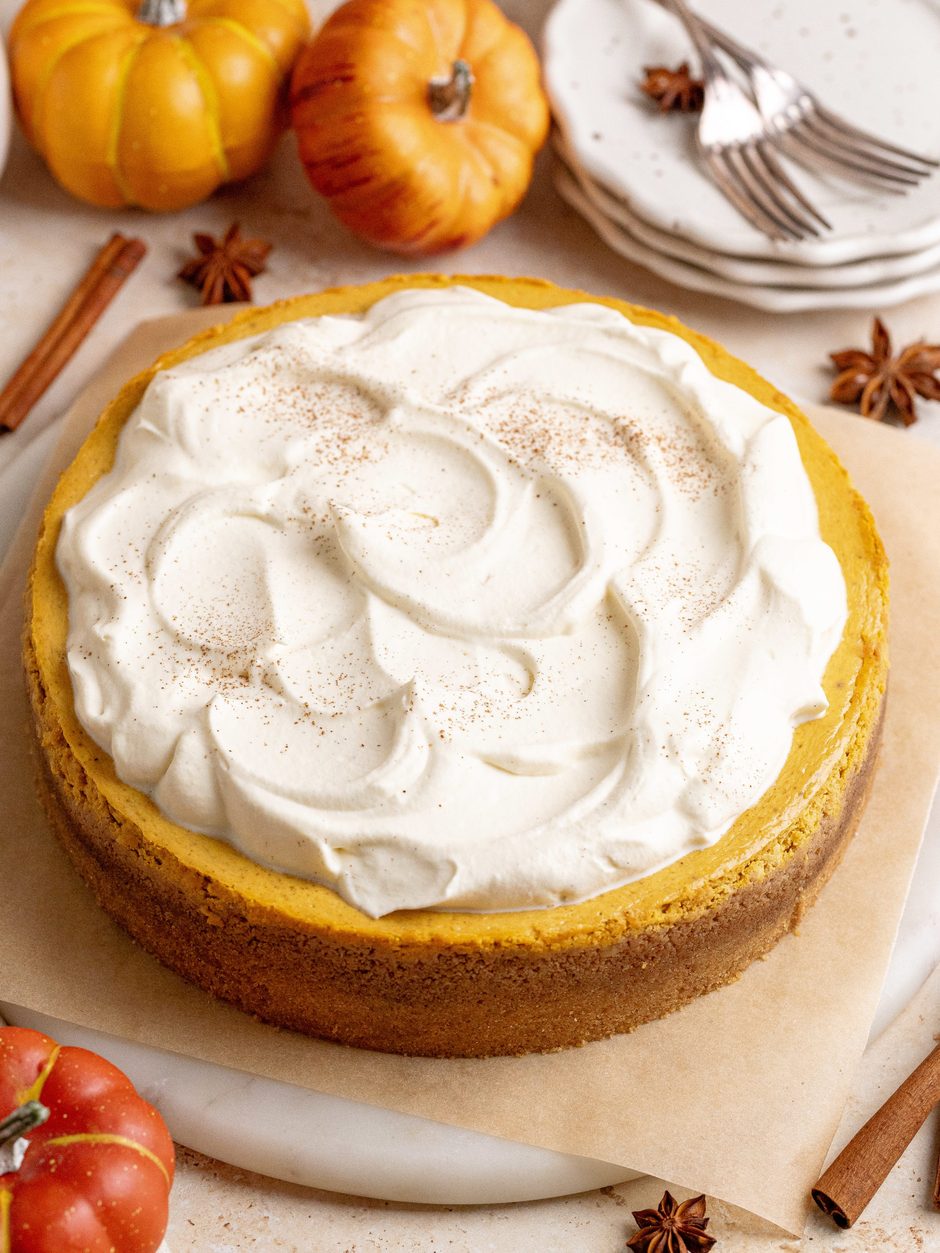 The whole cheesecake topped with maple whipped cream