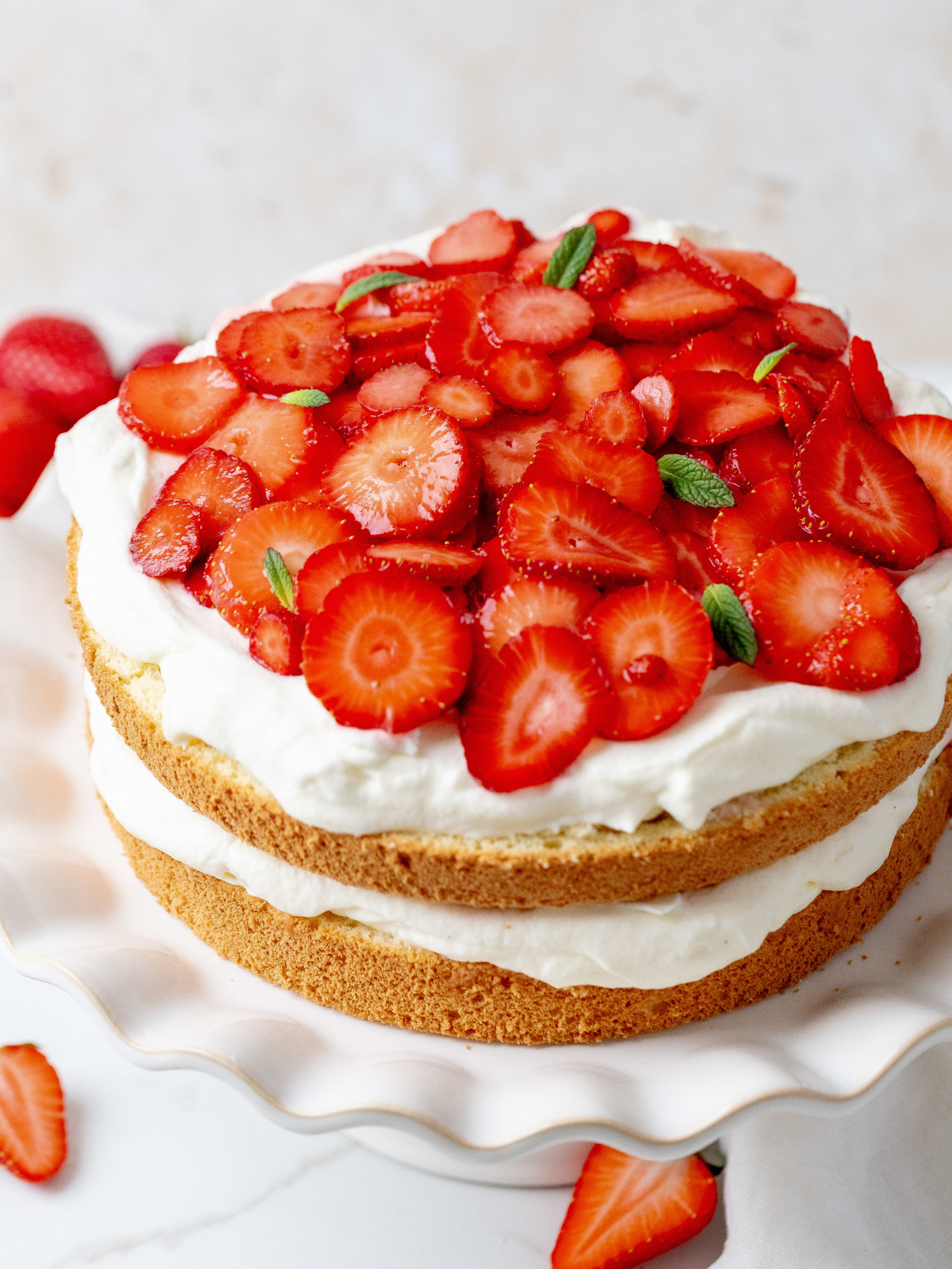 Strawberry and cream cake viewed from the top.